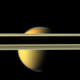 Titan, partially obscured by Saturn’s rings. Image: NASA/JPL-Caltech/Space Science Institute